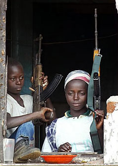 Child soldiers with guns