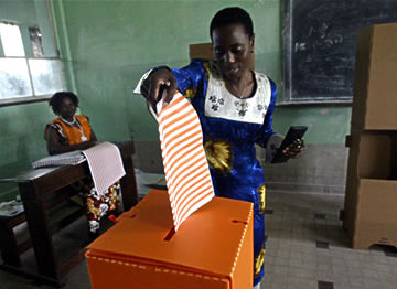 Woman voting in the Congo