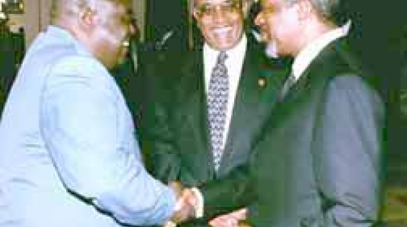 Focus on human rights: Mr. Annan with President Kabila (far left) and OAU Secretary-General Salim Salim