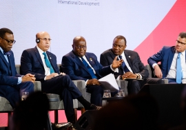 A group of five people at the leaders panel on stage at the UK-Africa Investment Summit.