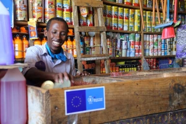 ​Retailers are embracing the system, because it brings them new customers who couldn’t afford to buy food from shops before. Photo:WFP/Laila Ali