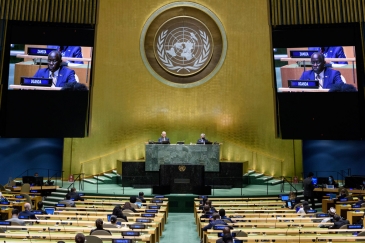 Prime Minister Abdalla Adam Hamdok (on screen) of the Republic of the Sudan addresses the general...