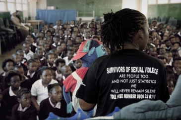 School children in Cape Town, South Africa, attend a theatre show that educates them about rape. Photo: Panos/George Philipas