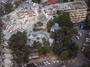 102 from UN die in quake, which collapses UN Headquarters.