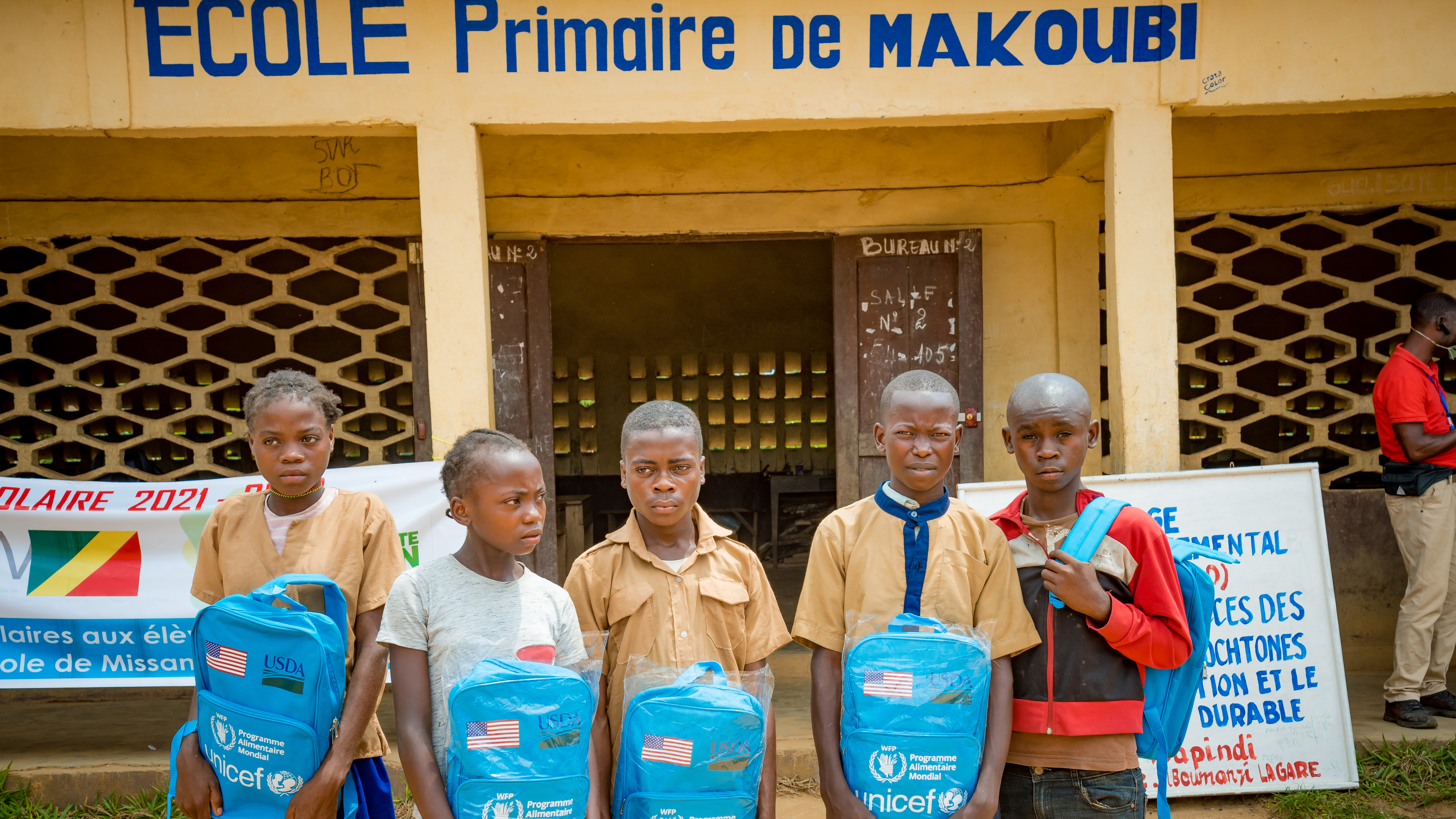 children with school bags from UNICEF
