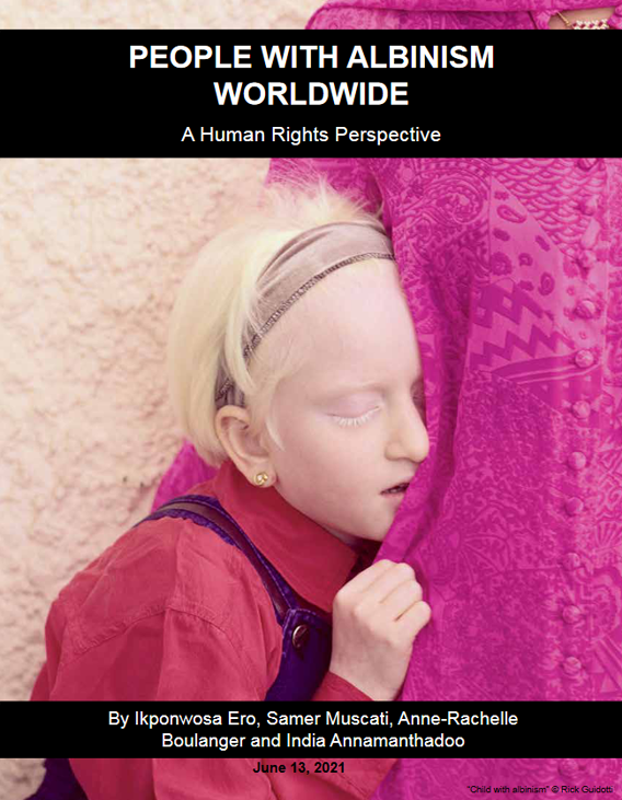 cover image of the report Albinism Worldwide 2021 depicting a child with albinism clinging to the robes of an adult
