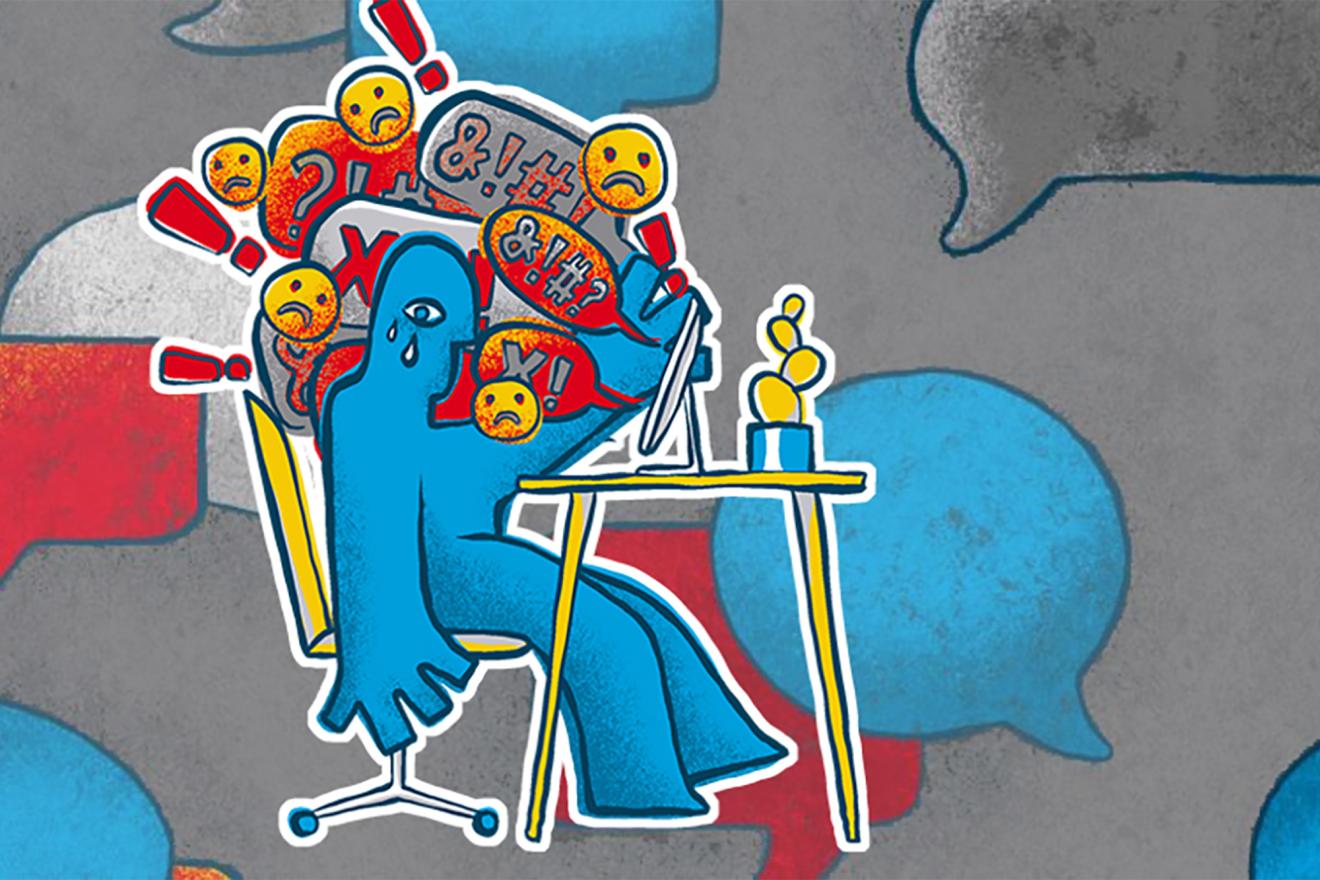 A graphic representation of a person sitting at a table in front of a computer receiving hate messages online.