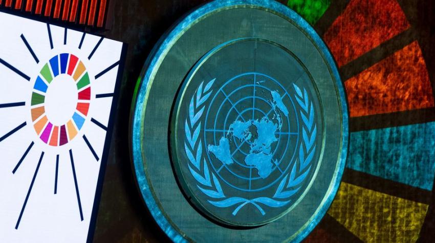 UN Photo/Cia Pak.  A projection of the SDG logo in the General Assembly Hall